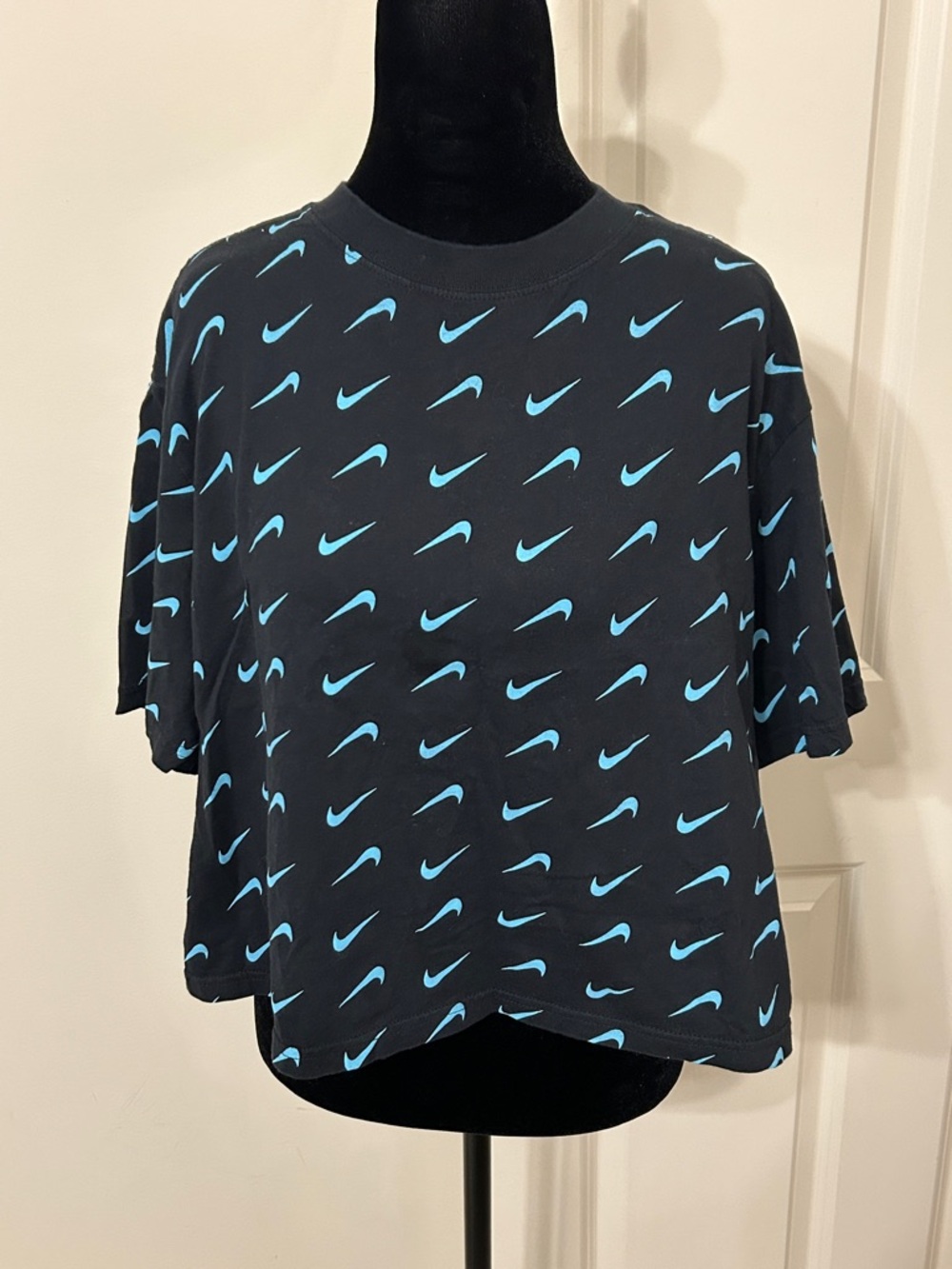 Nike Black Crop Tee with Light Blue Swoosh Print